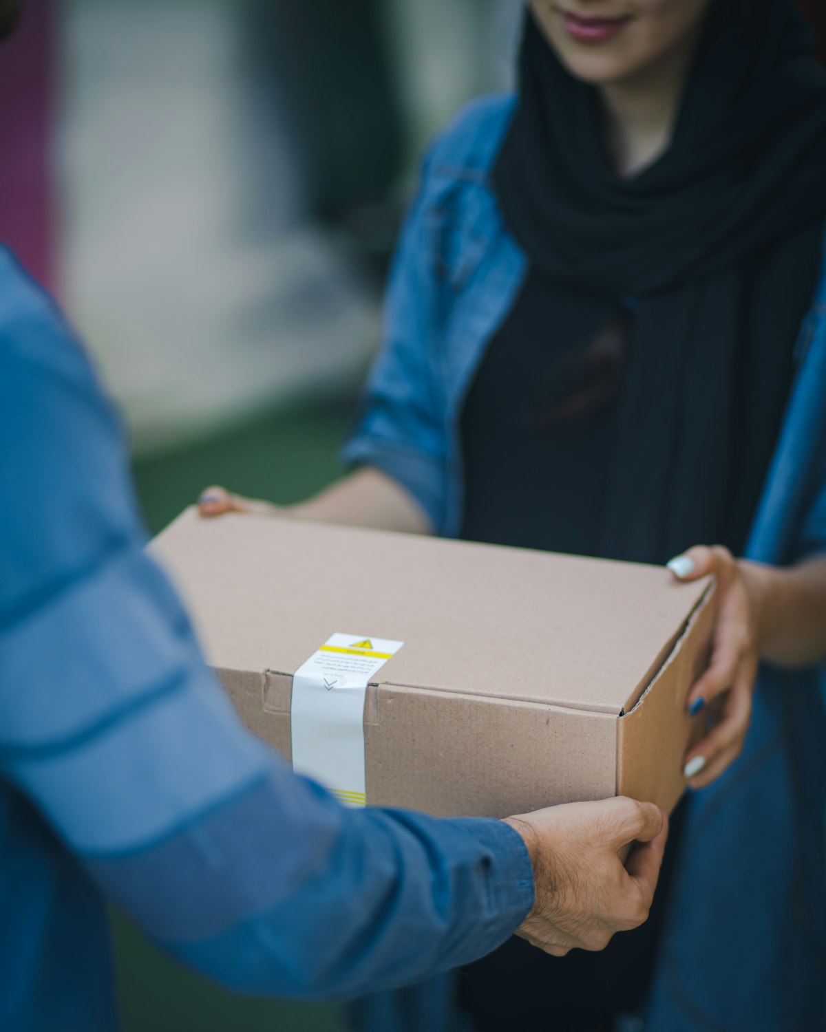 A package being handed to a customer